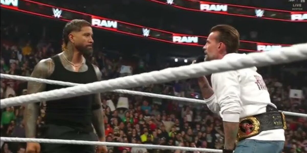 Jey Uso and CM Punk face off in the ring on WWE Raw