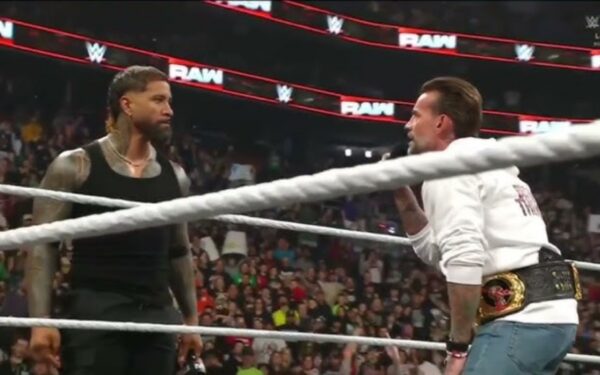 Jey Uso and CM Punk face off in the ring on WWE Raw