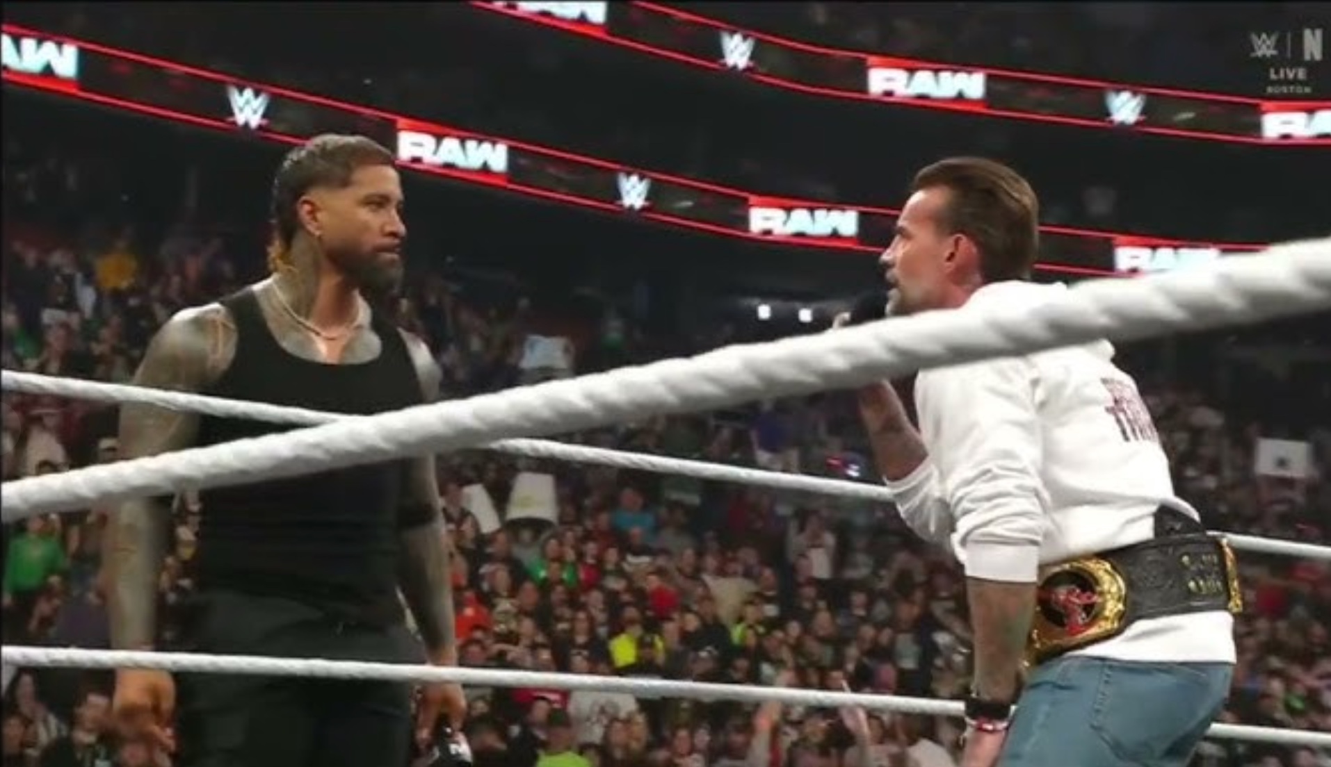 Jey Uso and CM Punk face off in the ring on WWE Raw